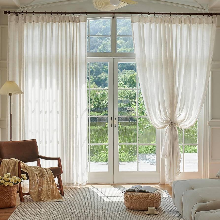 Emphasize natural light by using sheer curtains in your living room