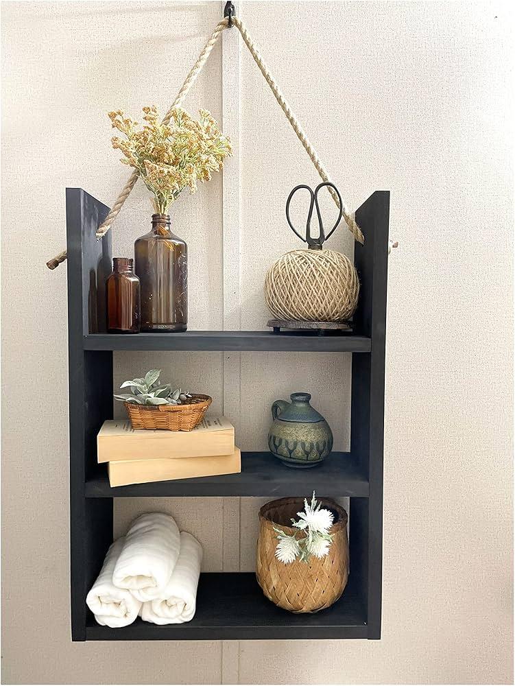 Distressed wood shelves display toiletries ​while‌ enhancing farmhouse bathroom decor