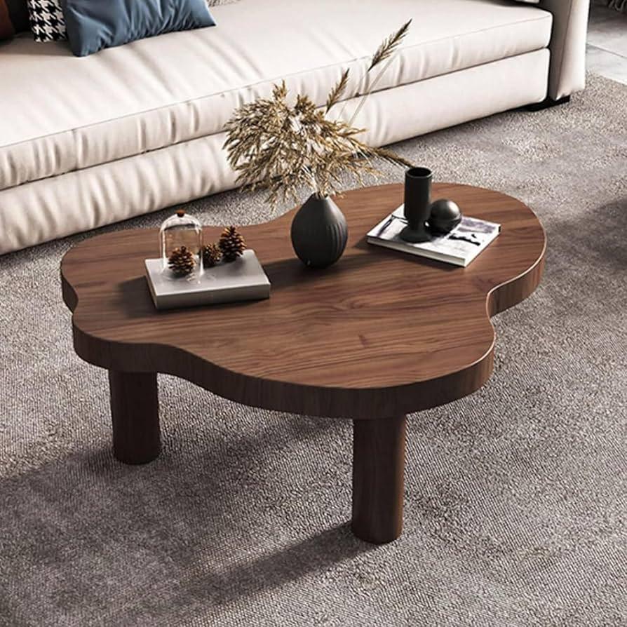 Choose a nature-inspired coffee table to serve⁤ as⁤ a focal point ‍in your ⁢earthy living room