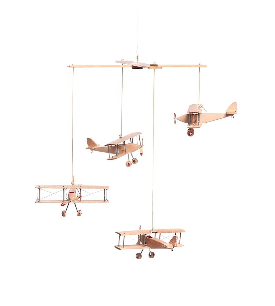 Vintage ​Airplanes:⁤ Fly high with a nursery featuring classic aircraft and clouds