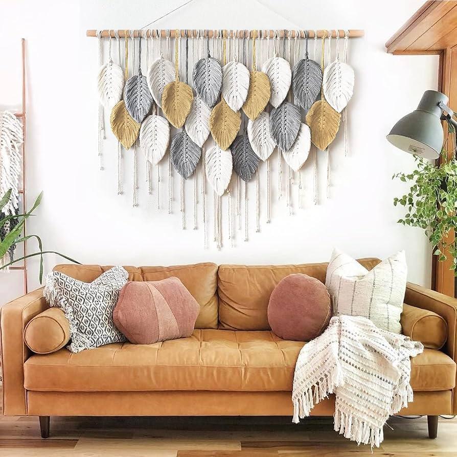 Incorporate macramé wall ​hangings to add texture and personality to your Boho Living Room