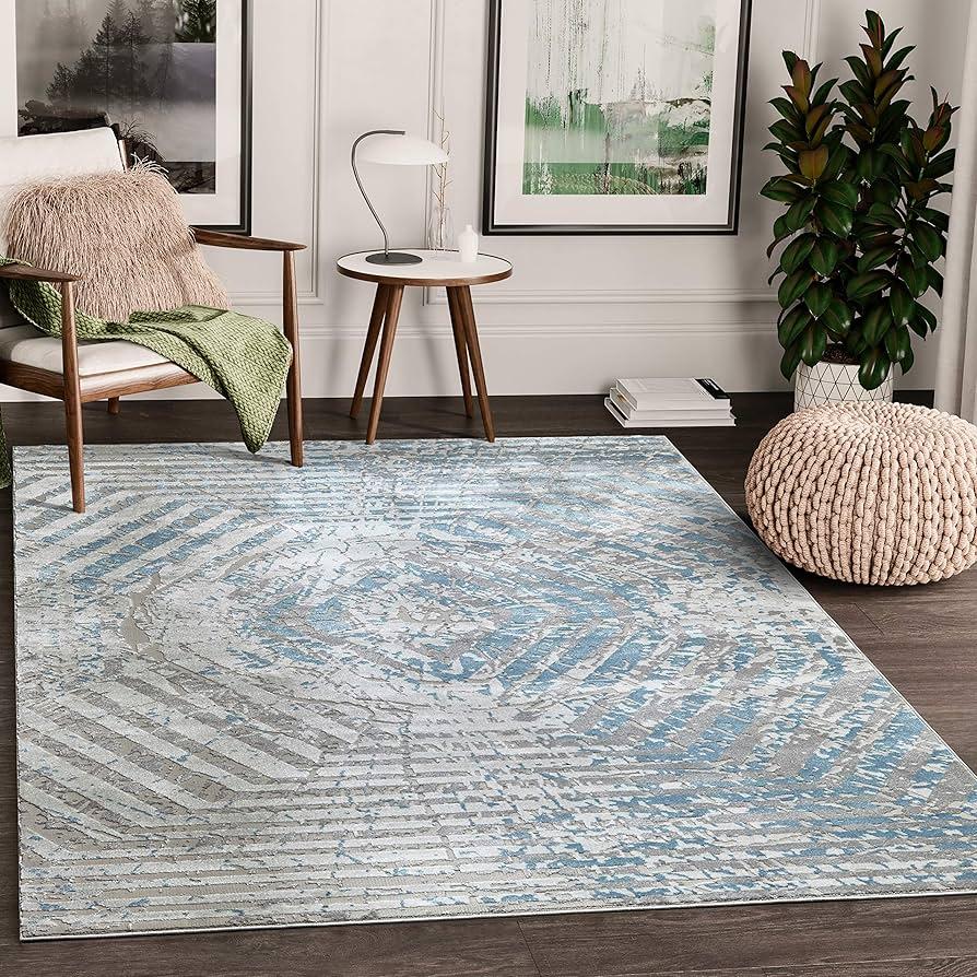 Incorporate ‌a ⁢blue ‌area rug for comfort and style