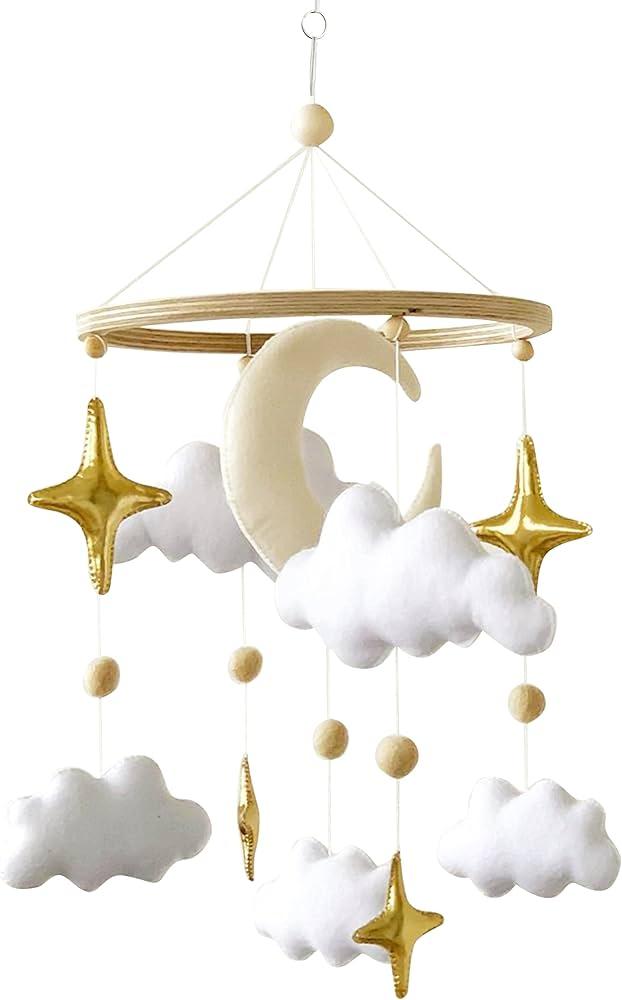 Integrate a mobile with soothing movements above the crib in your Nursery Nook