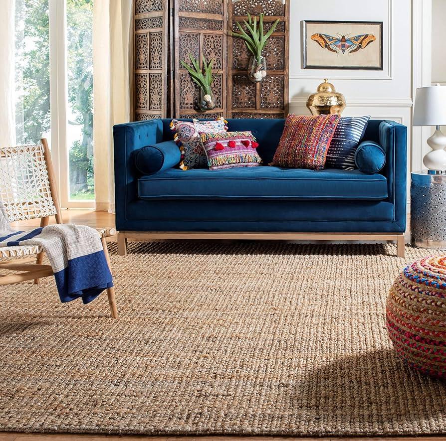 Experiment ​with a mix of textures like jute and velvet in your earthy living room