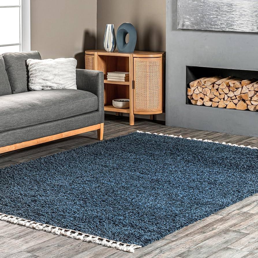 Highlight a statement ​blue living room rug for added depth