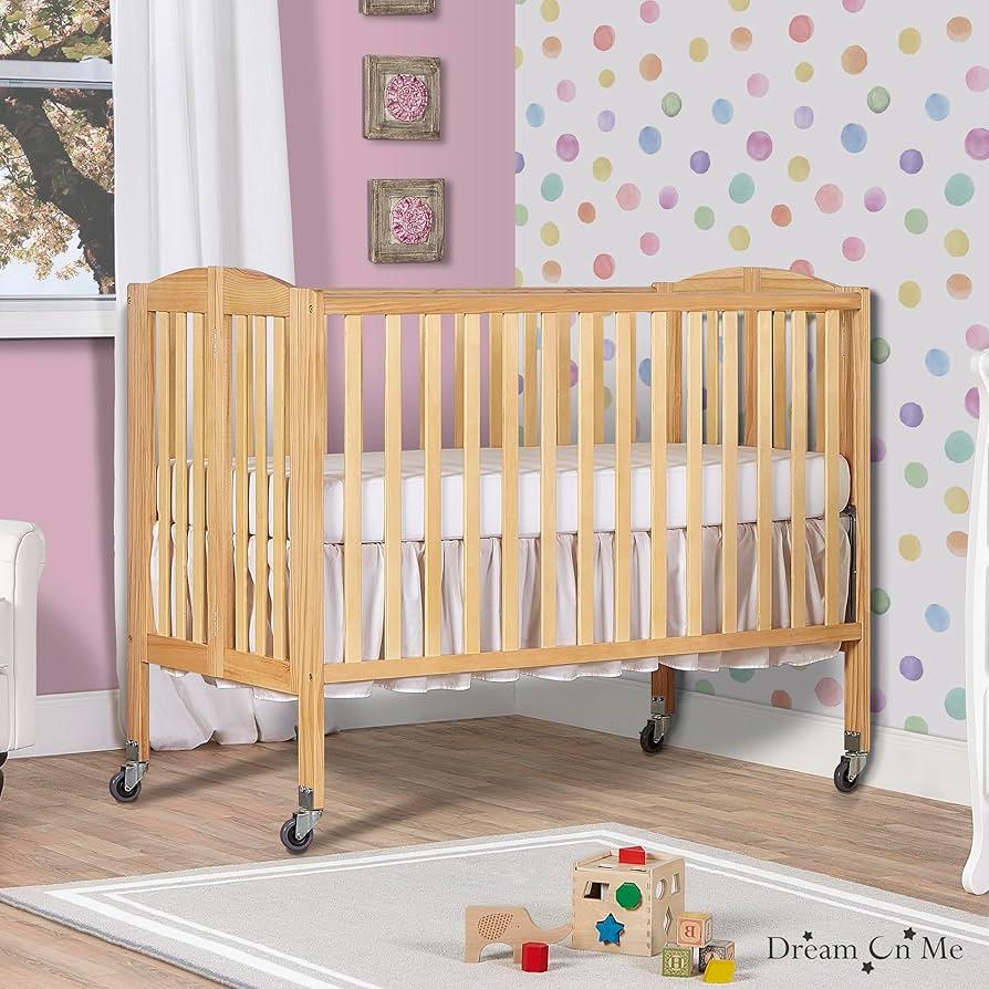 Utilize a foldable crib for flexibility in your small nursery