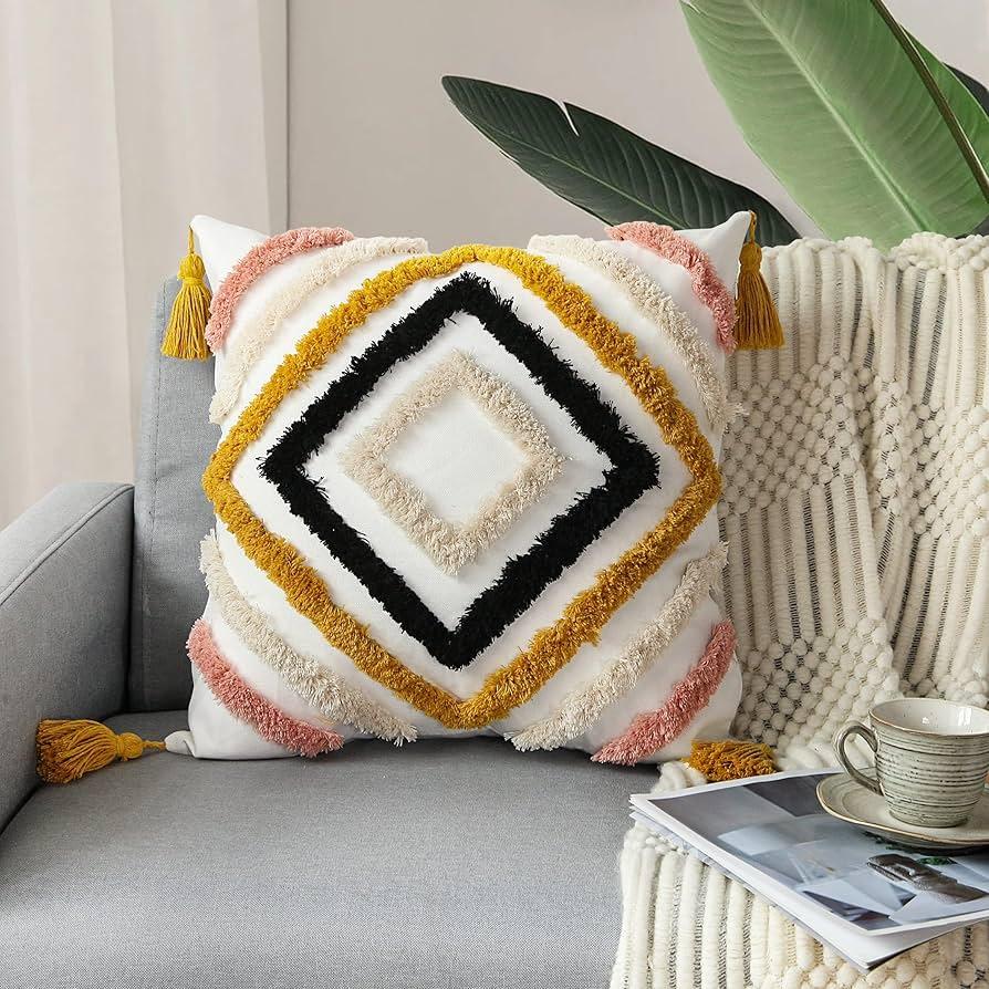 Arrange cushions with various patterns for playful accents in your Boho Living Room