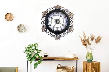 Integrate unexpected decor items, like a vintage clock, in your eclectic bathroom design