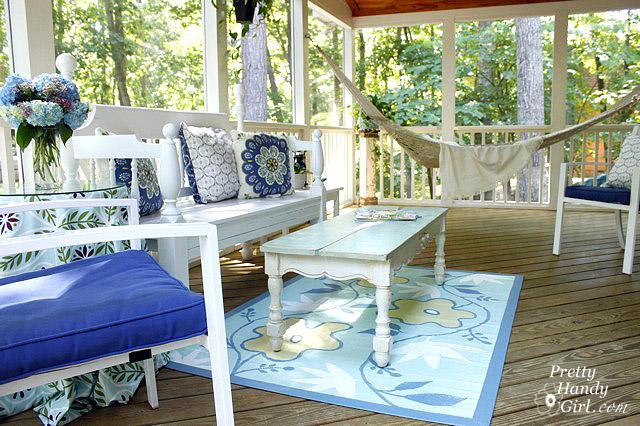 Use repurposed furniture for unique charm in your ‌screened porch