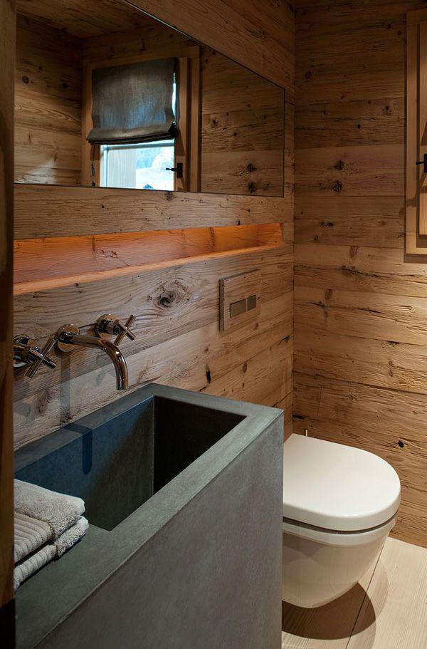 Incorporate wood paneling for a true Chalet Bathroom‍ feel