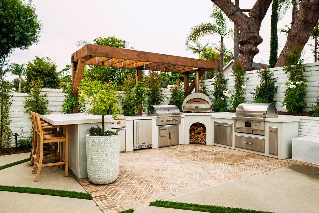 Outdoor kitchen‍ bringing convenience and‍ culinary ⁢joy​ to your backyard