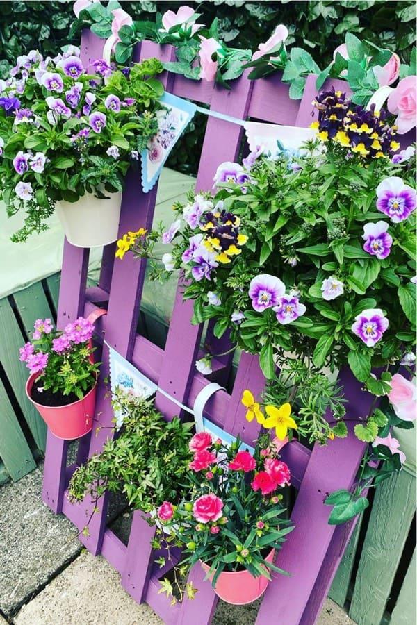 Colorful Pallet Garden Art: Add artistic flair to your garden with vibrant pallets