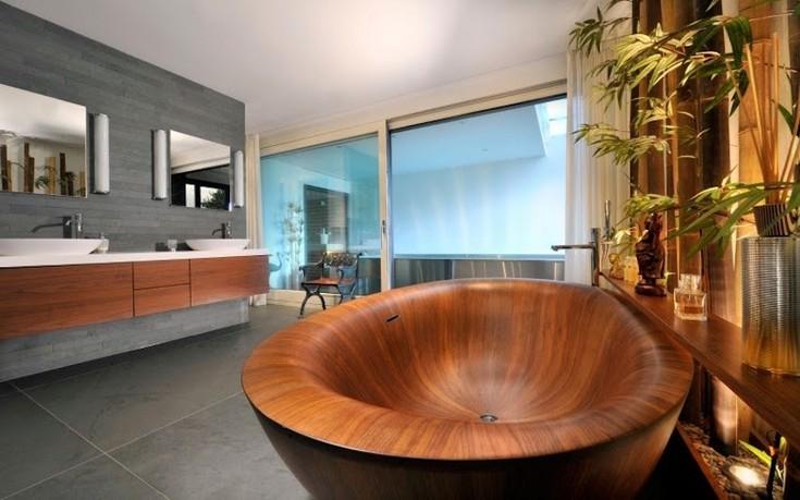 Install a wooden bathtub to ​create a luxurious focal point in your wooden bathroom