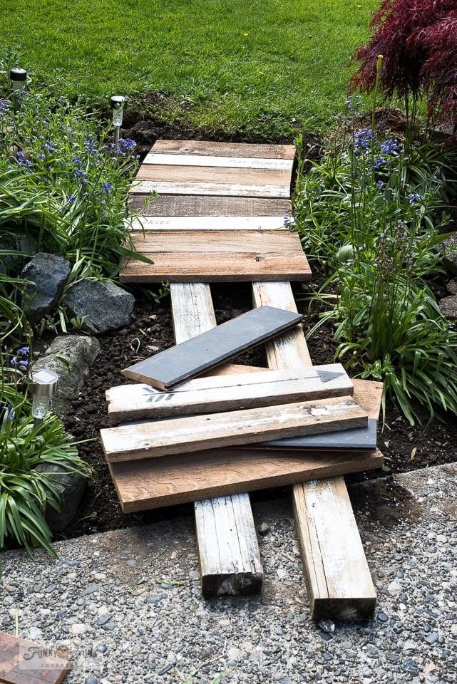 Incorporate recycled pallet wood for a charming garden path