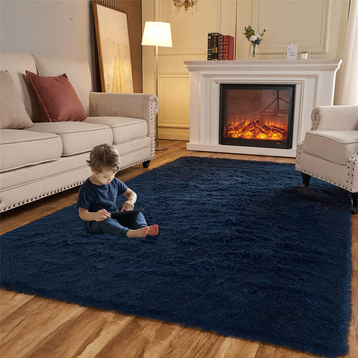 Add a ⁣stylish rug to ground your blue living room space