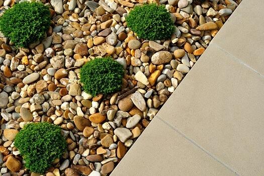 Layer a pallet garden with stones for a natural texture contrast