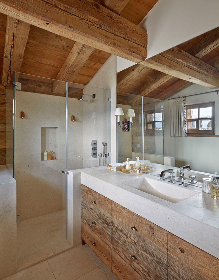 Add a wooden bath mat for warmth in your Chalet Bathroom