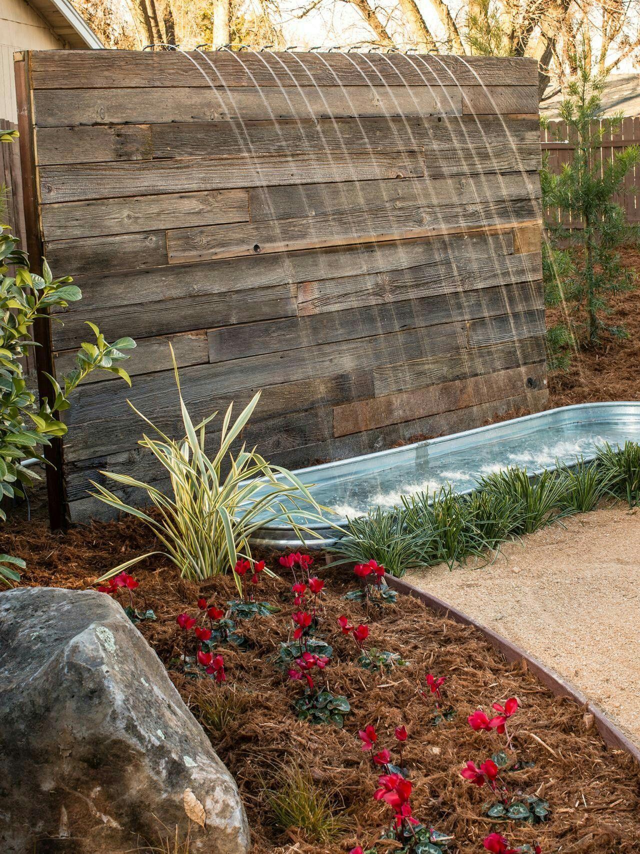 Pallet Garden Water Feature: Create a serene environment with a tranquil focal point