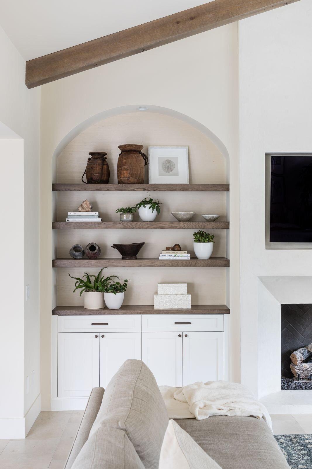 Use open shelving to display curated decor in your contemporary living room