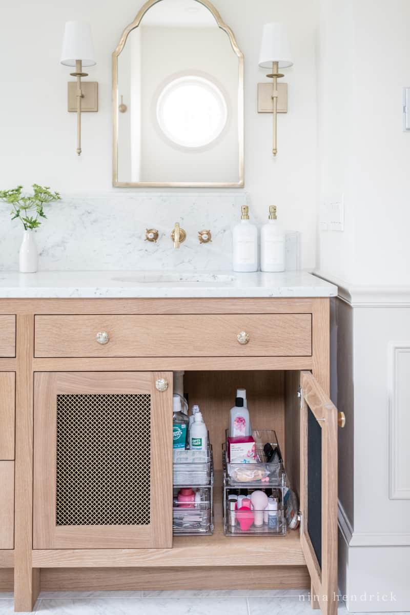 Integrate wooden bathroom storage solutions for a tidy yet stylish retreat