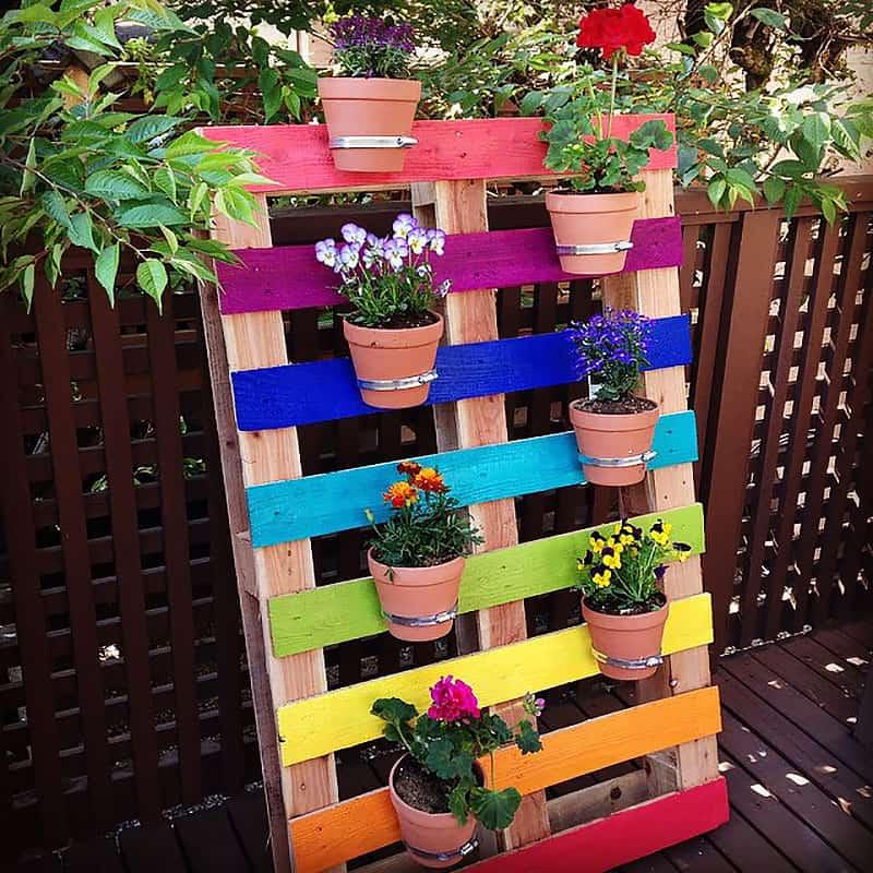 Hang indoor plants in a creative pallet garden arrangement