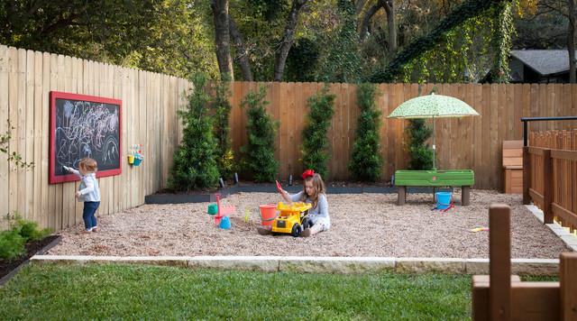 Create a dedicated play area for kids in your backyard oasis