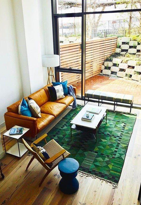 Dont underestimate the power of a statement rug in interior design