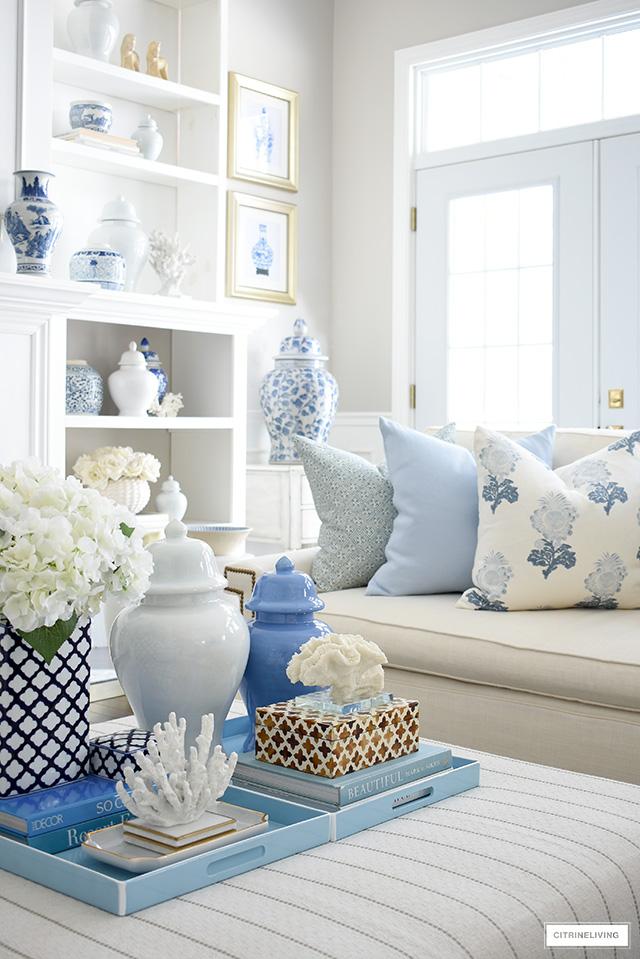 Personalize your blue living room with cherished mementos and photos