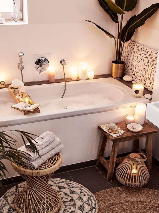 Use candlelight to set the mood in your boho bathroom