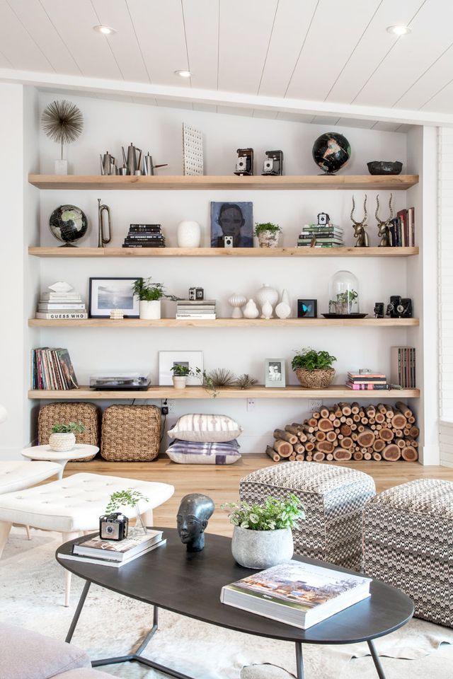 Incorporate floating shelves to‍ display‍ art in your contemporary living room