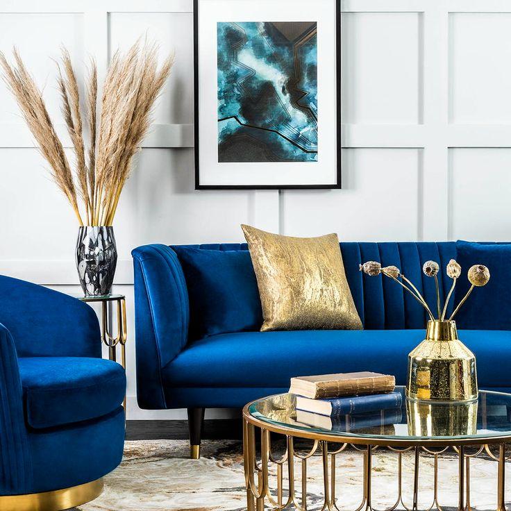 Use a statement ‌blue sofa as‍ a focal point in the living ‍room