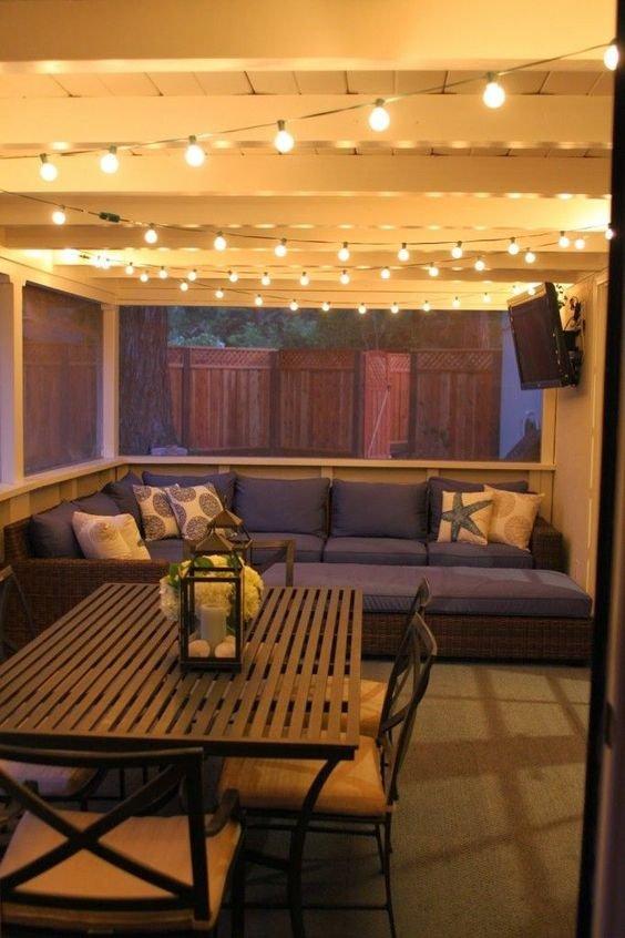 Hang string lights ⁢to illuminate your Screened Porch with enchanting ambiance