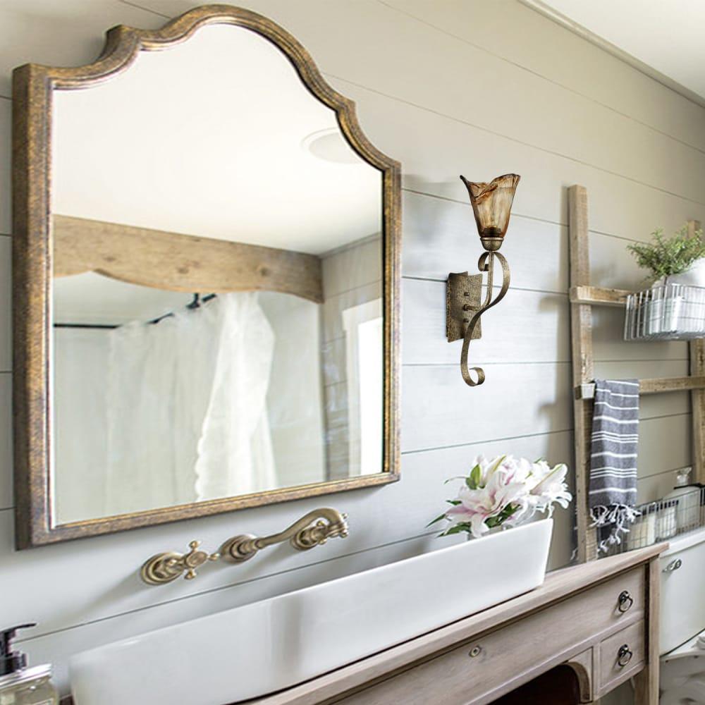 Install sconces with a vintage finish to illuminate your ⁣farmhouse bathroom with warm light