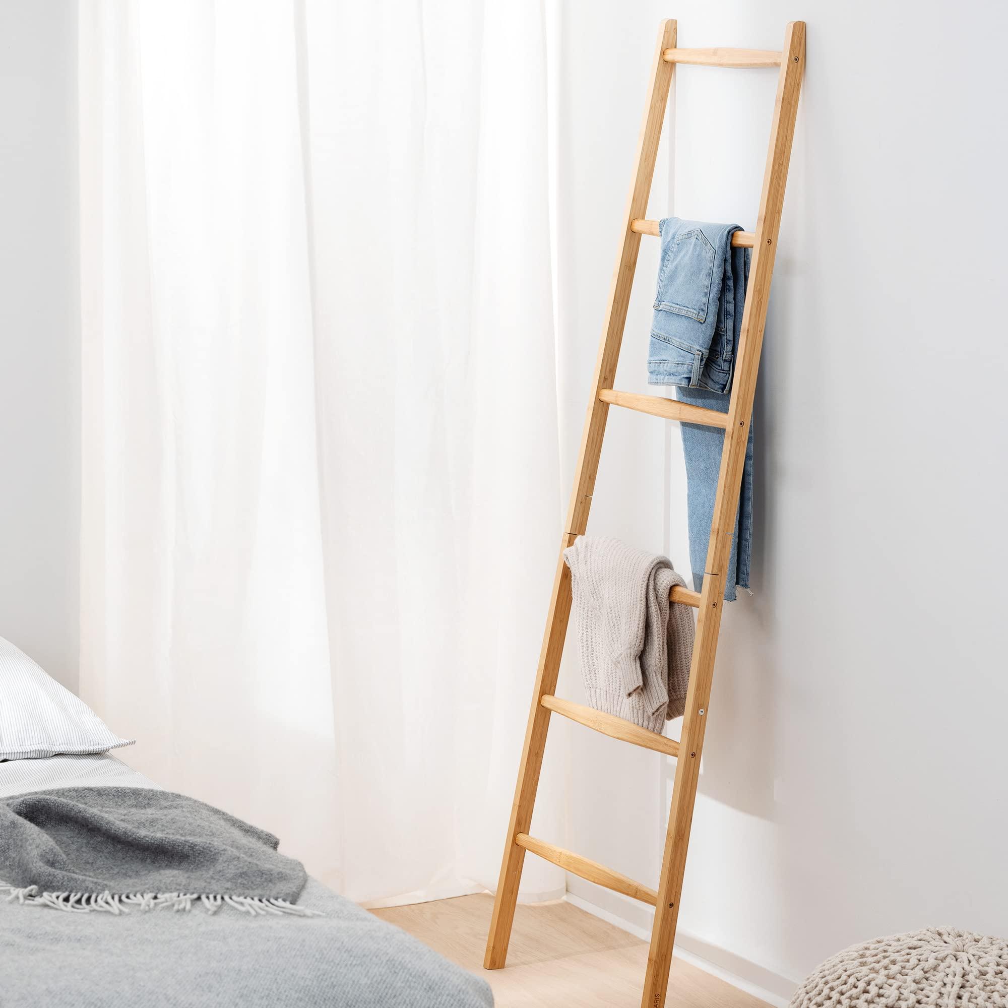 Incorporate a ​wooden ⁣ladder for hanging ⁤towels adding a rustic ​touch to ⁤your wooden bathroom