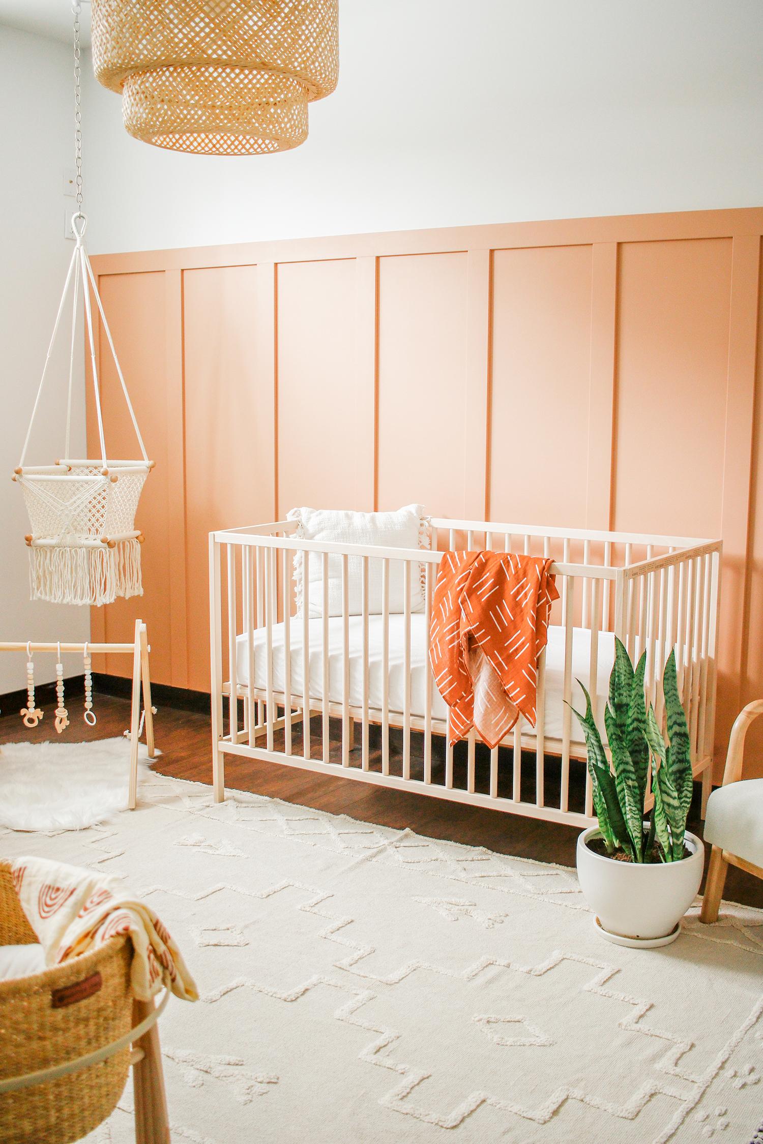 Add an accent wall to create interest in your small nursery