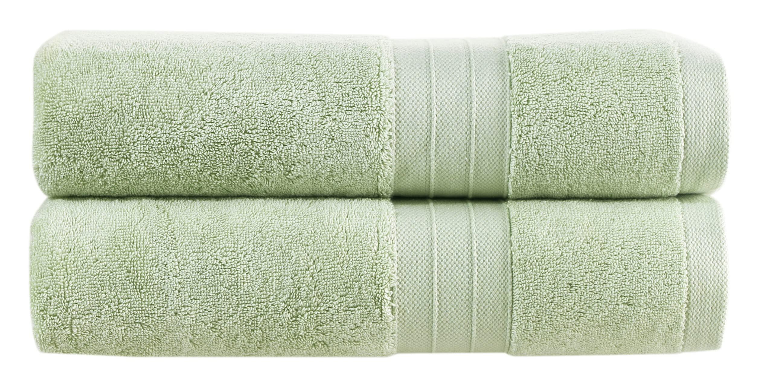 Add fluffy towels in soft hues to create comfort in your wooden bathroom