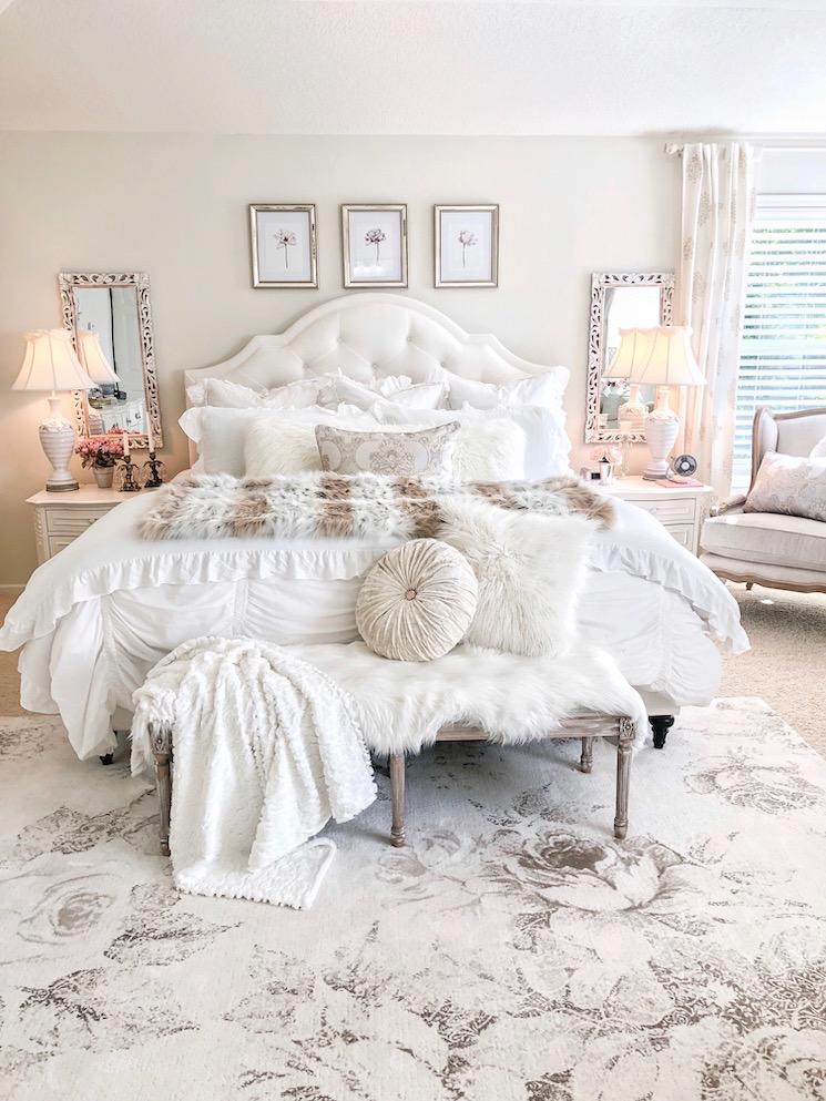 Vintage Glam Bedroom: Mix antique furnishings with luxurious fabrics for elegance