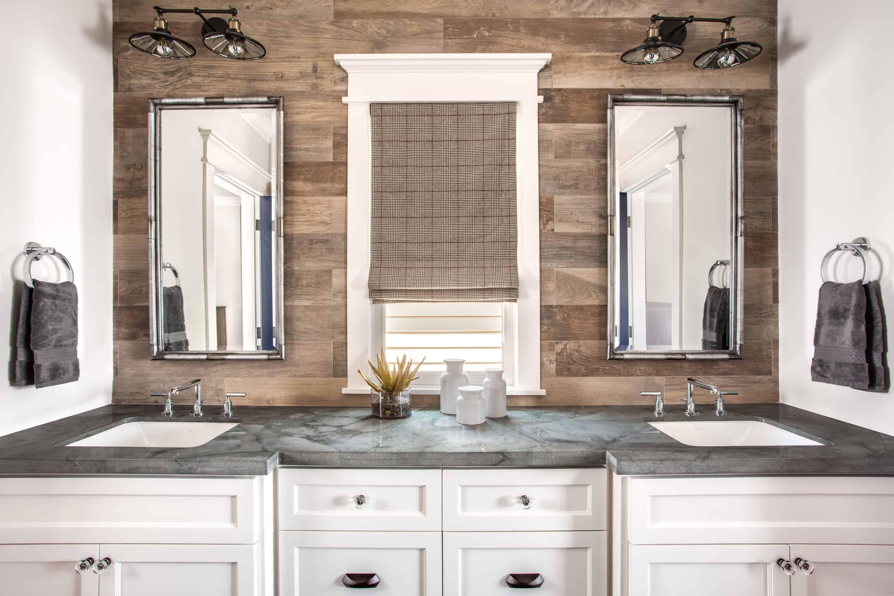 Introduce natural stone accents alongside wood for a balanced look in your wooden bathroom