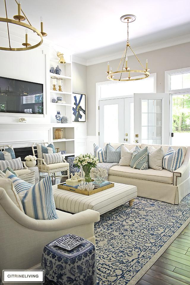 Mix patterns​ like stripes and florals in your blue living room