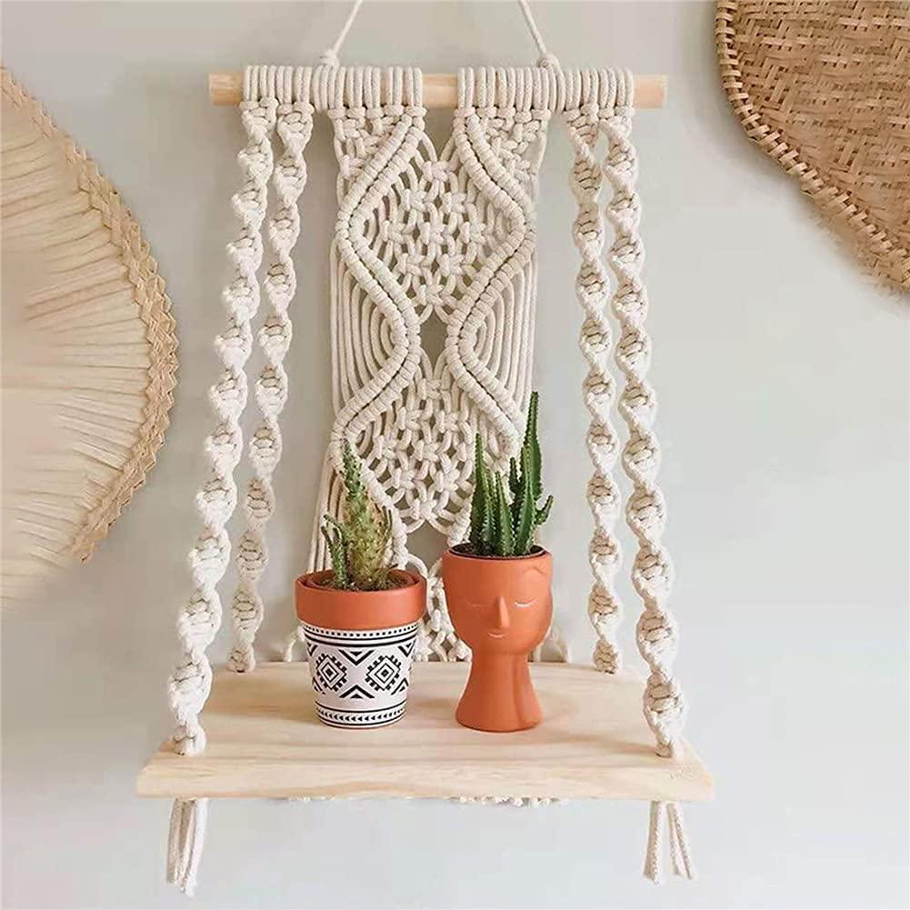 Use macramé hangers to display greenery in your boho bathroom