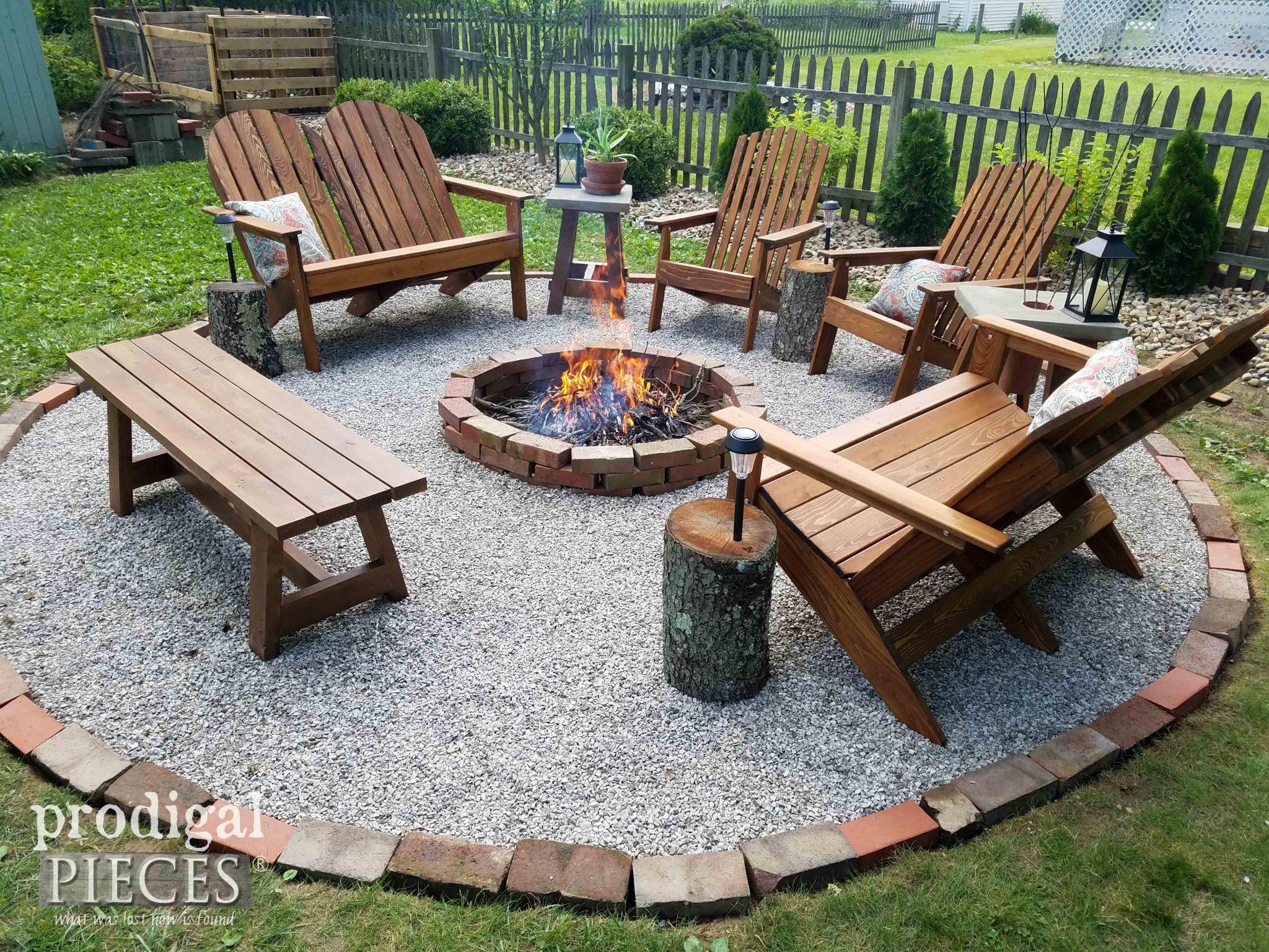 Create a cozy fire pit area in ⁢your backyard