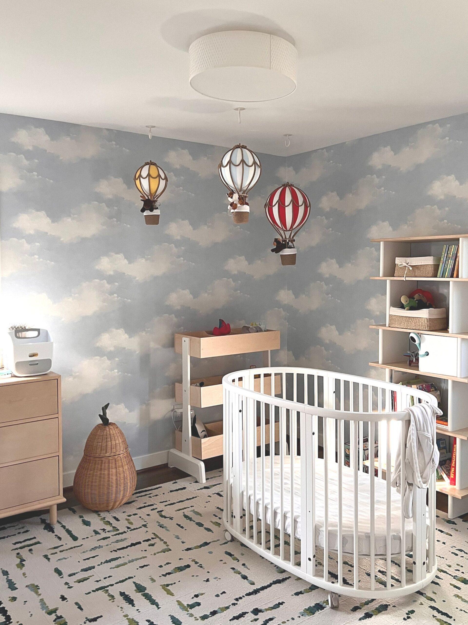 Air Balloon Adventure:​ Soar high in a​ nursery decorated with balloons