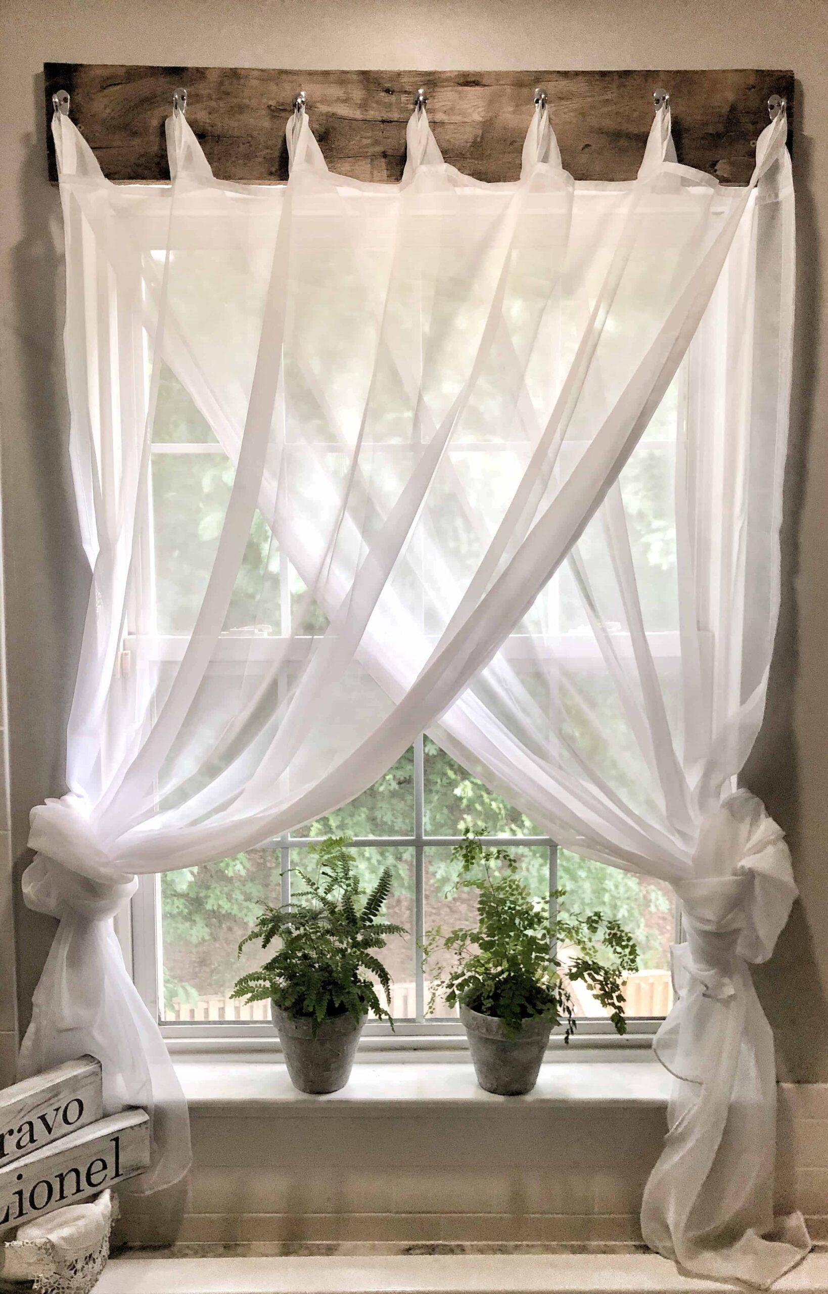 Frame the‍ window with⁢ soft, flowing curtains for added ‌warmth ‌and ​charm