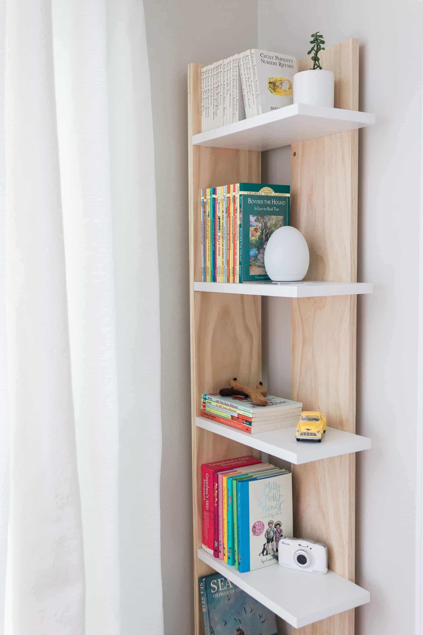 Use corner shelves for additional space in⁣ your small nursery