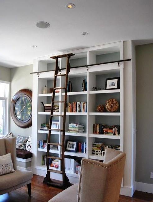 Utilize unexpected items like stepladders for shelving in ‍your eclectic living room