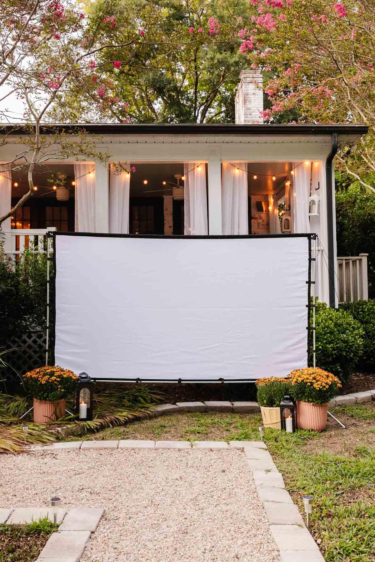 Create a backyard movie theater with a projector