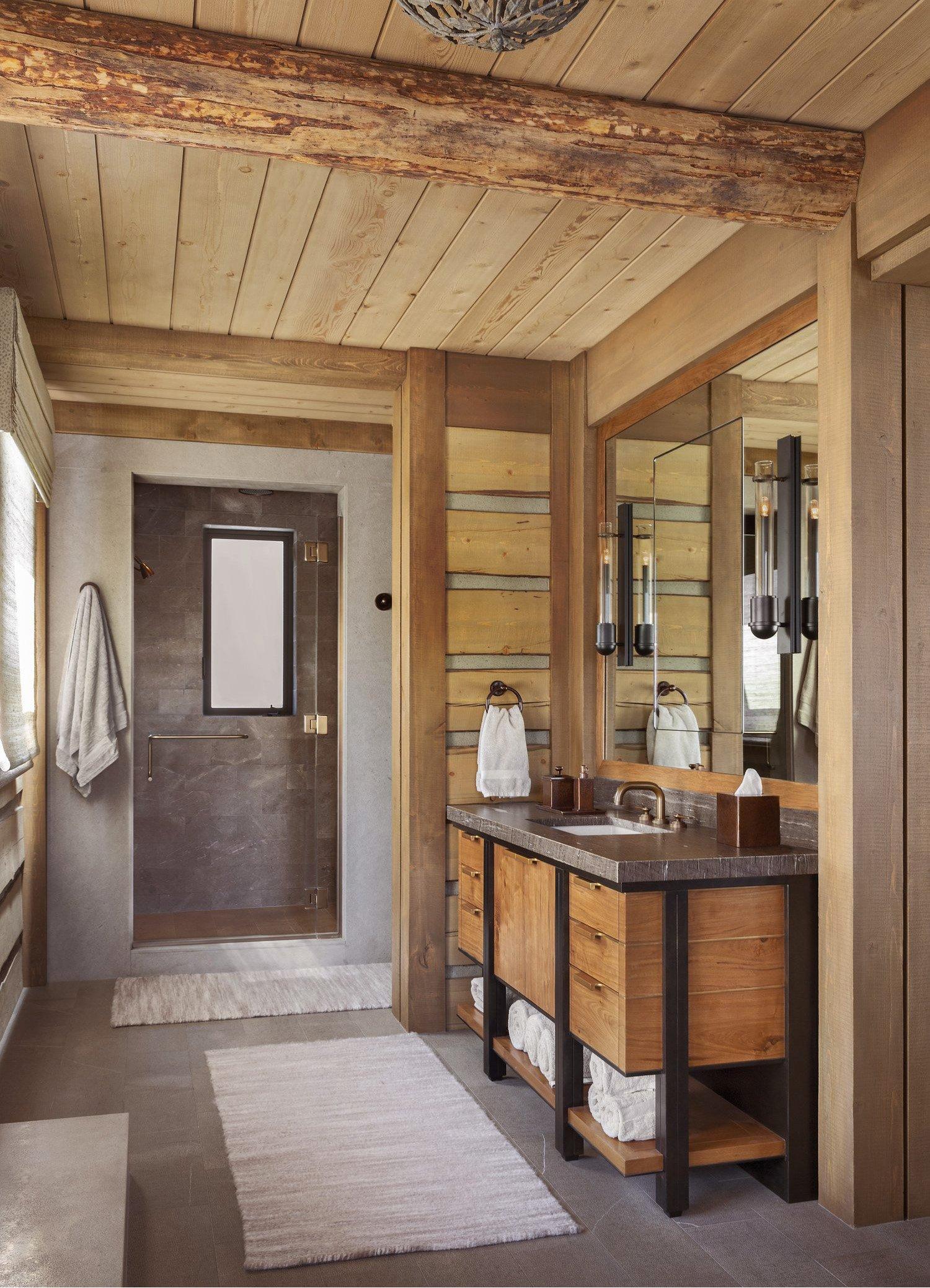 Use a wooden stool​ for a rustic touch in ​your Chalet Bathroom