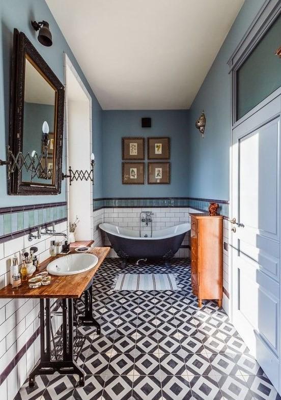 Incorporate layered ​textiles like vibrant rugs and towels for an eclectic bathroom feel