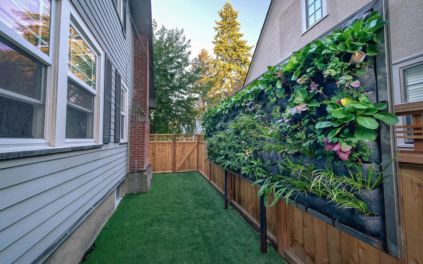 Design a vertical garden‌ for stunning backyard​ greenery