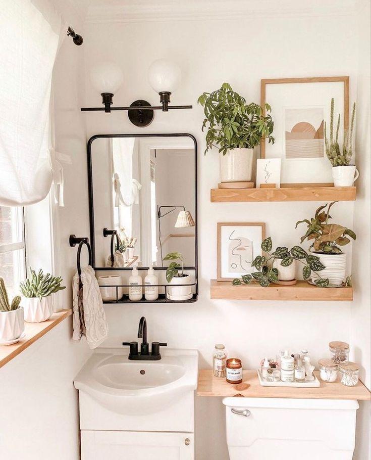 Minimalist furniture pieces to maintain open space in your boho‌ bathroom